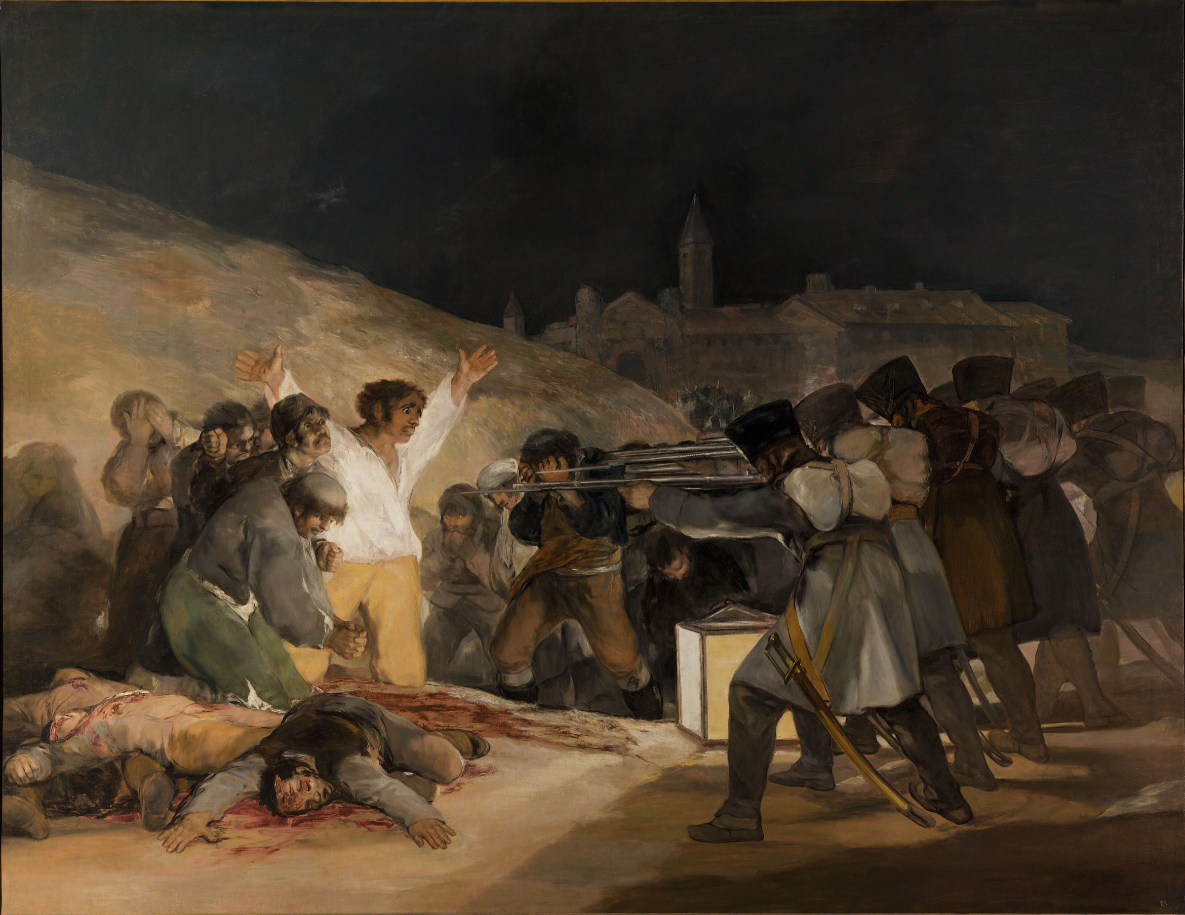 Goya’s nighttime scene of French soldiers executing Spanish civilians on May 3, 1808.